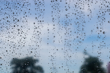 Transparent glass rain drops after a rainy day