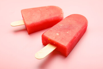 Tasty watermelon ice-cream on color background