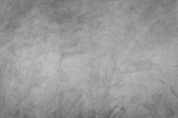 Abstract background of modern loft cement texture. The gray concrete wall has some scratch without a fixed pattern. Can be used in graphic design and for creating various backgrounds.