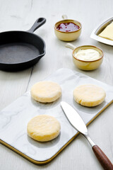 Fresh cheese pancake on marble serving board