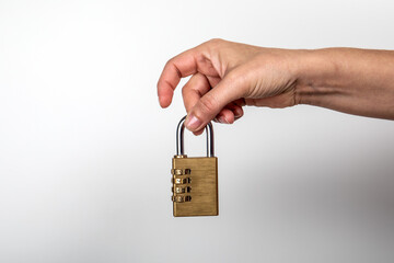 Padlock in woman's hand. Data, information, property and security on the Internet concept