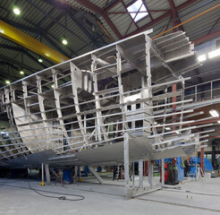 Aluminium hull of a yacht at the shipyard. Airframe. Ship building industry. Super sailing yacht. Netherlands. Air frame.
