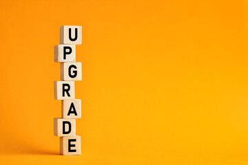 The word upgrade on wooden cubes. Computer, network, internet business technology upgrade concept. - obrazy, fototapety, plakaty