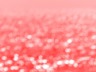 Red and pink blurred defocused bokeh background, Christmas and New Year concept