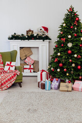 The interior of the room is a green Christmas tree with red gifts for the new year decor winter holiday