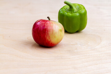 red apple on a wooden table