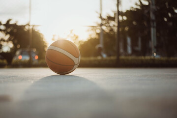Basketball ball on court outdoor.