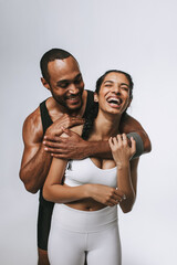Fototapeta na wymiar Portrait of happy fitness couple