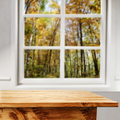 desk of free space and blurred window 