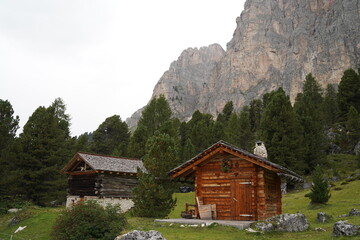 Fototapeta na wymiar Two mountain huts in dolomites italy