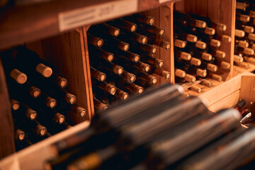 Bottles of wine with corks stored in wine cellar