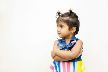 Fototapeta premium Cute Indian girl child showing cute expression