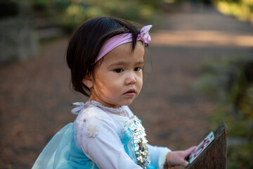 little princes girl playing in the park