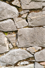 Fototapeta premium Background of stone wall close up.