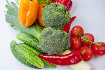 Vegetables on a white background. Broccoli top view.
