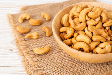 Cashew nuts in wooden bowl