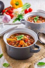 Delicious Italian vegetable minestrone soup with ingredients