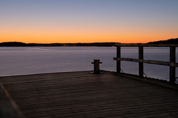 Naklejka na ściany i meble Sunset on the lake in Tampere, Finland