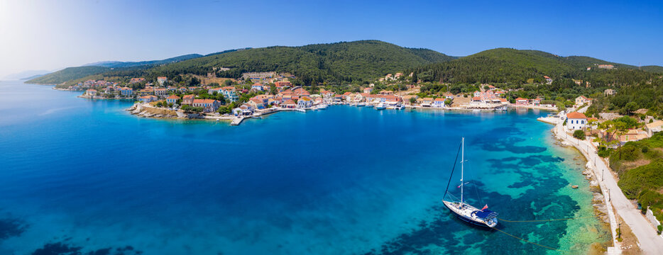 Aerial, panoramic view to the beautiful town of Fiscardo, Kefalonia island, Greece, marina and hub for many sailors and travelers