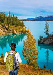 Middle-aged woman admires the lake