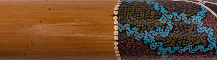 Close up of a bamboo tube with decorations
