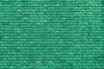 Green brick building wall. Interior of a modern loft. Background for design.