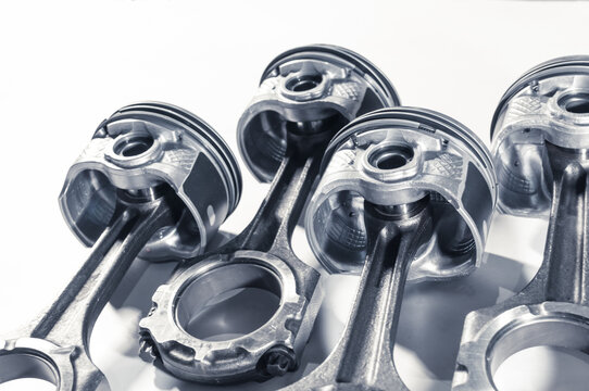 pistons with connecting rod engine car on white background. Close up
