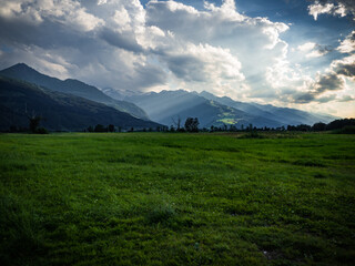 Great and dramatic view to the peaks of Austrian Alps during sunset in Hohe Tauern national park near nice and small city Zell amd See, Austria, Europe.