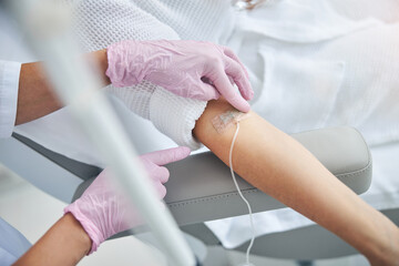 Caucasian woman patient undergoing a medical procedure