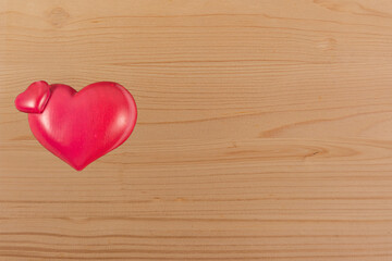 Natural wooden background with heart. Valentine's day concept