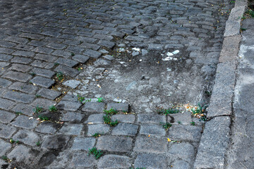 Broken pavements sidewalks on the sidewalk. pavement with paving slabs with defects and cracks...