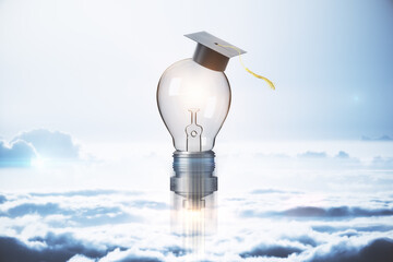 Rocket light bulb in graduate cap