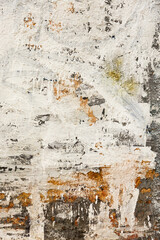 Background texture wall with peeling old paint. Old wooden background with remains of pieces of scraps of old paint on wood. Texture of an old tree, board with paint, vintage background peeling paint