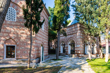 Fototapeta na wymiar Ottoman gravestones museum and ottoman tombs view of Muradiye complex in Bursa. Bursa is populer tourist destination in Turkey.