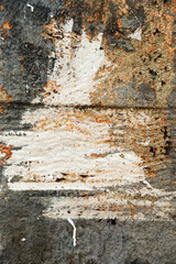 Background texture wall with peeling old paint. Old wooden background with remains of pieces of scraps of old paint on wood. Texture of an old tree, board with paint, vintage background peeling paint