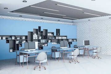 Clean coworking office interior with computers  and shelves with documents.