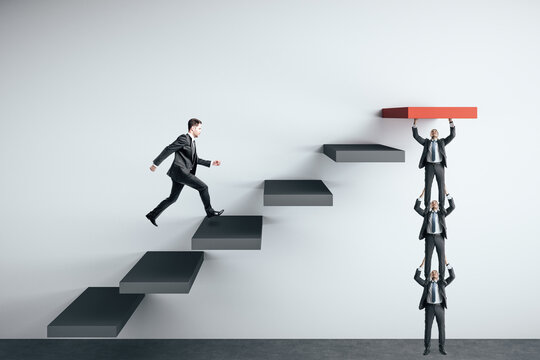 Businessman Runing On Stairs To Success On Wall.