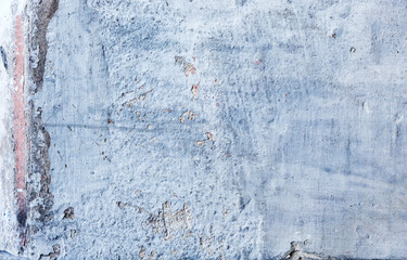 Background texture wall with peeling old paint. Old wooden background with remains of pieces of scraps of old paint on wood. Texture of an old tree, board with paint, vintage background peeling paint