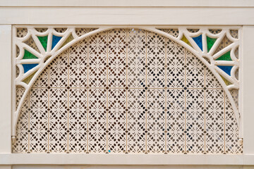 Arabic arch door woodcut trellis panel stencil lattice engraving decorative panel with oriental geometric pattern exterior architecture the traditional oriental Mosque historical building