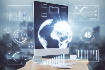 Financial chart drawing and table with computer on background. Double exposure. Concept of...