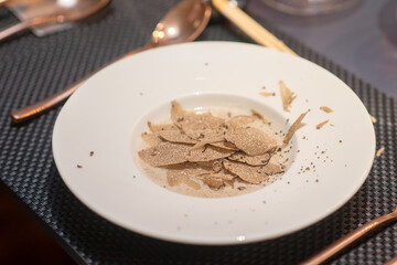 truffles mushroom  soup sprinkle with sliced black truffles