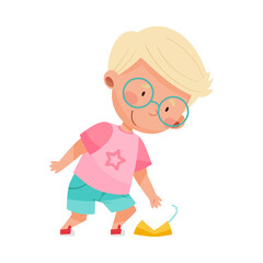 Cute Boy Gathering Trash from the Ground Vector Illustration