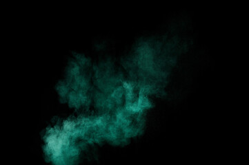 Aquamarine powder explosion on black background. Colored powder cloud. Colorful dust explode. Paint  Holi.