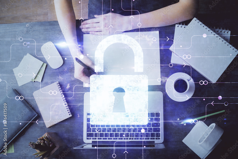 Poster double exposure of woman's hands writing with lock icon. concept of security and protection of data