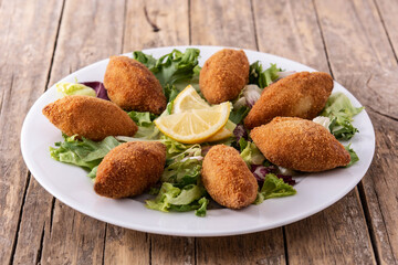 Traditional lebanese kibbeh on wooden table	