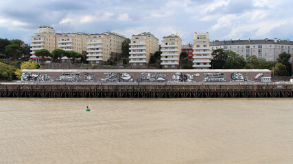 warehouse and flats buildings along the river Loire in nantes (france)