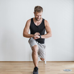 Handsome man working out at home