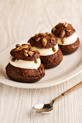 Dessert Shu cake on plate on red background