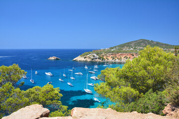 Cala d'Hort bay with turquoise water on Ibiza island, Spain.