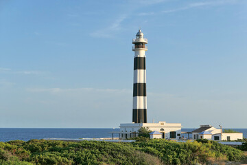Fototapeta na wymiar Lighthouse Cap d'Artrutx on Menorca island in Spain